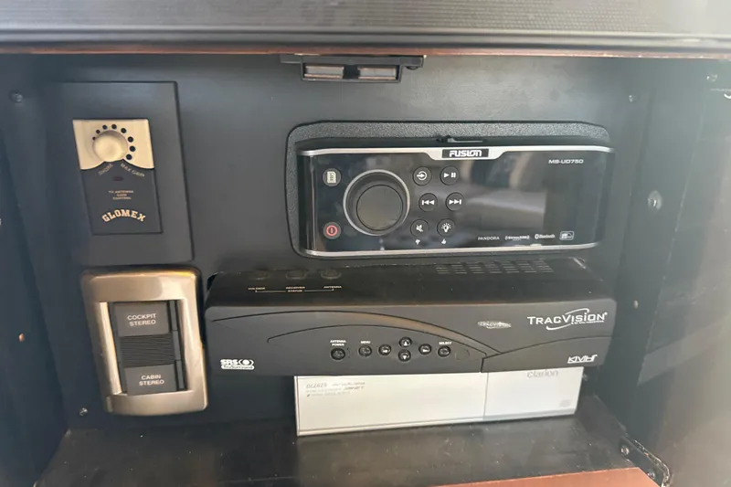  Yacht Photos Pics Control panel of a 2006 Sea Ray 44 Sedan Bridge with stereo and navigation systems.