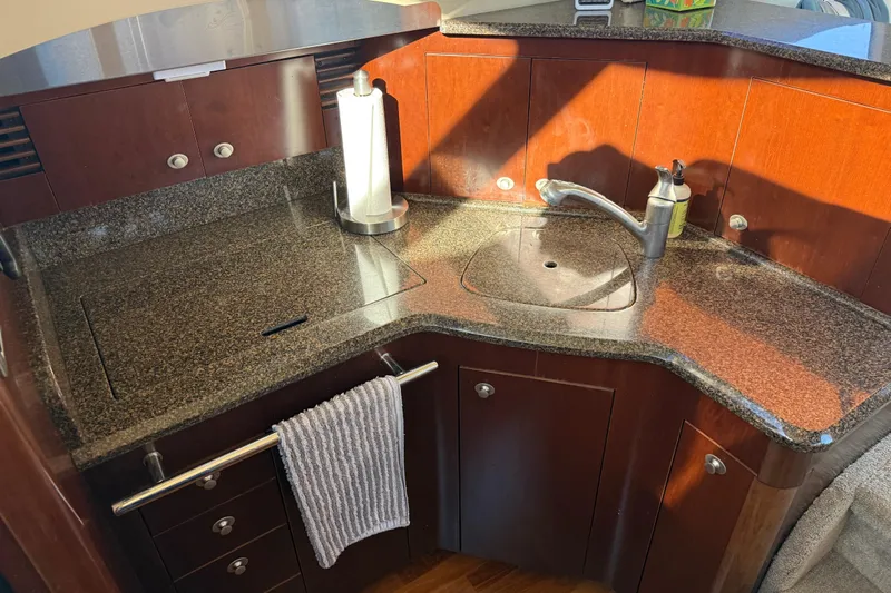  Yacht Photos Pics Luxurious kitchen area in a 2006 Sea Ray 44 Sedan Bridge yacht.