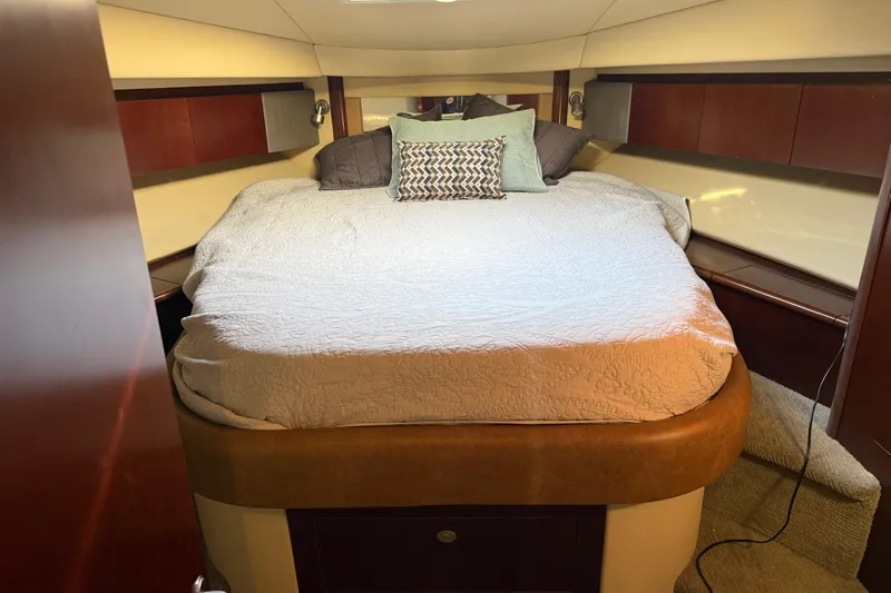  Yacht Photos Pics Luxurious bedroom interior of 2006 Sea Ray 44 Sedan Bridge yacht.