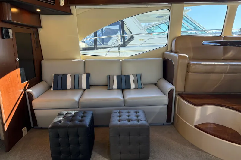  Yacht Photos Pics Luxurious interior of 2006 Sea Ray 44 Sedan Bridge yacht with modern seating.