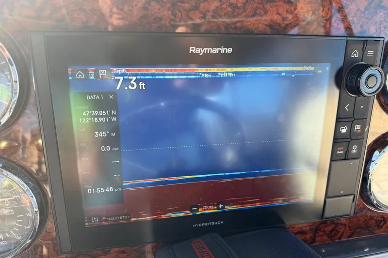  Yacht Photos Pics Raymarine display on 2006 Sea Ray 44 Sedan Bridge showing depth and navigation data.