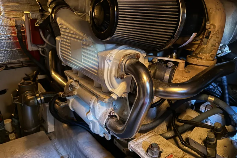  Yacht Photos Pics Engine compartment of 2006 Sea Ray 44 Sedan Bridge, showcasing detailed mechanical components.