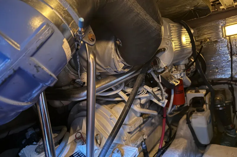  Yacht Photos Pics Engine room of 2006 Sea Ray 44 Sedan Bridge yacht, showcasing mechanical components.