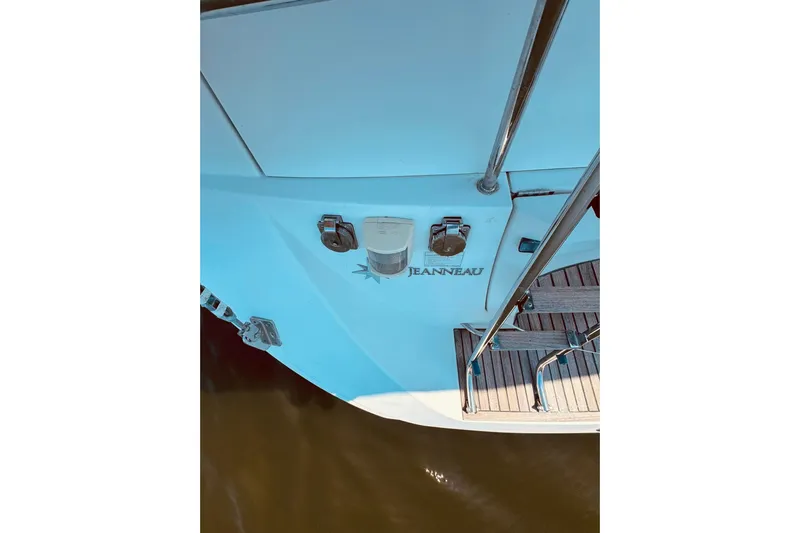 Bluefin Yacht Photos Pics Jeanneau Sun Odyssey 45 DS 2008 yacht stern with deck and ladder.