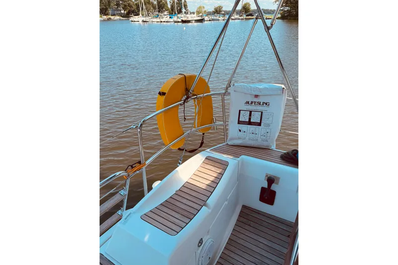 Bluefin Yacht Photos Pics 2008 Jeanneau Sun Odyssey 45 DS sailboat deck with lifesling and life preserver.