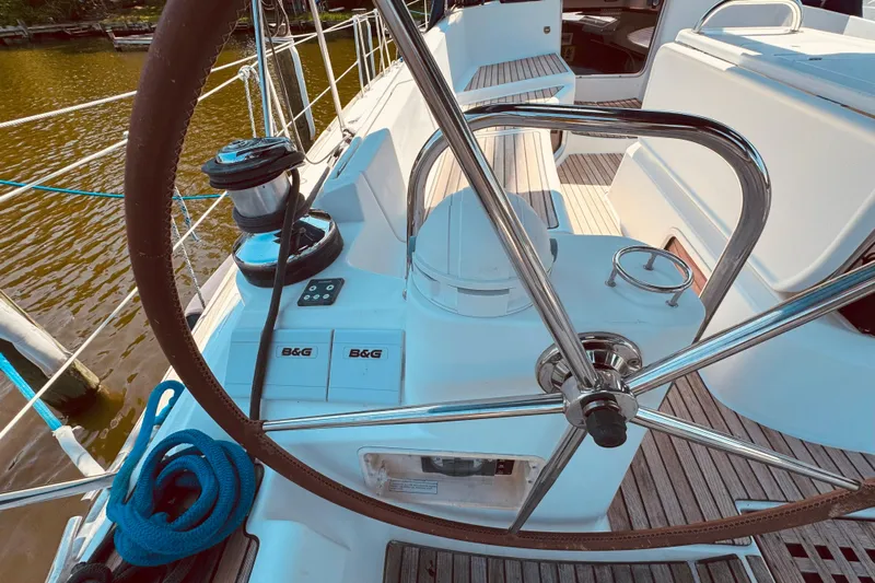 Bluefin Yacht Photos Pics Steering wheel and controls of 2008 Jeanneau Sun Odyssey 45 DS sailboat.