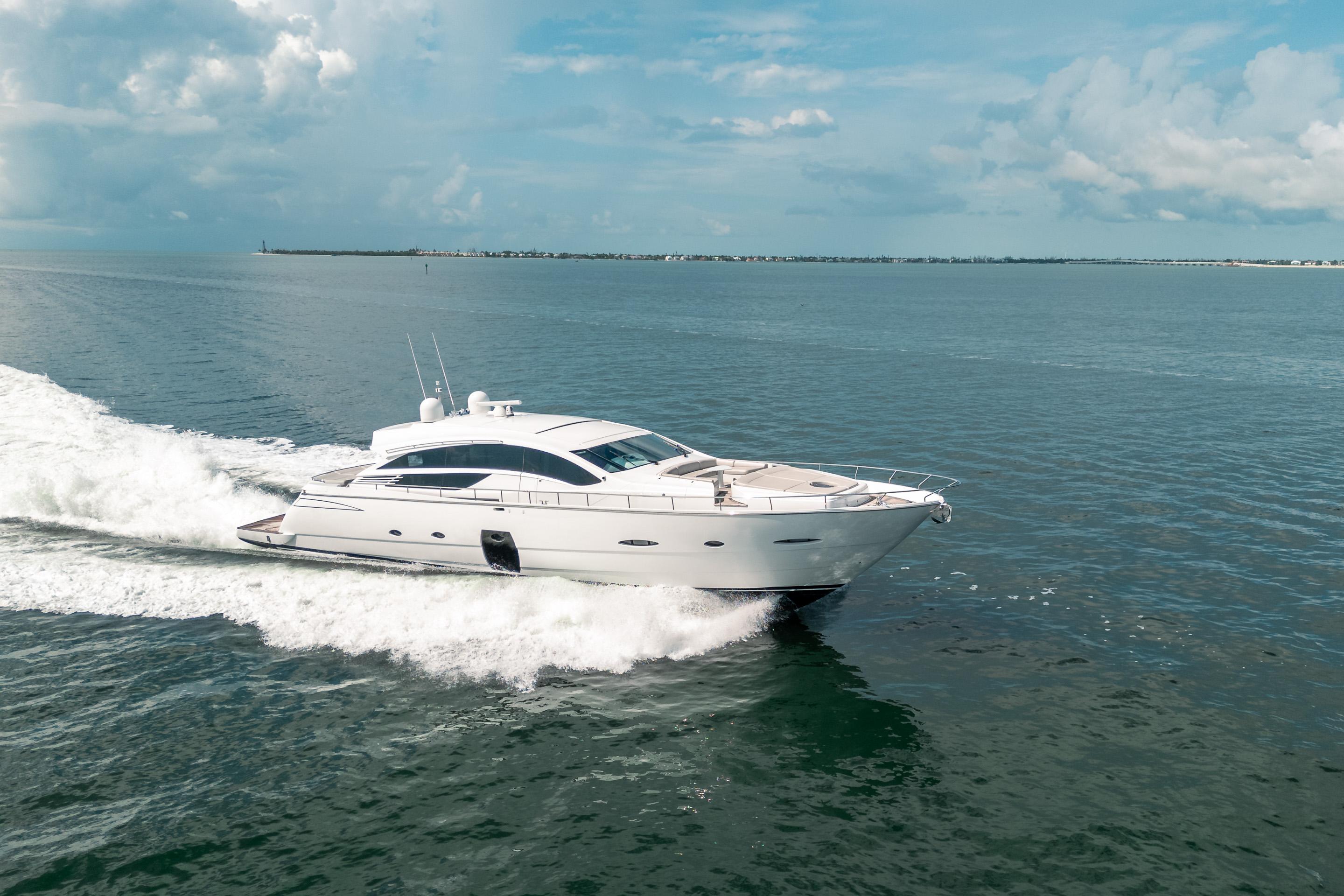 2010 Pershing 80 yacht cruising on open water under a clear sky.