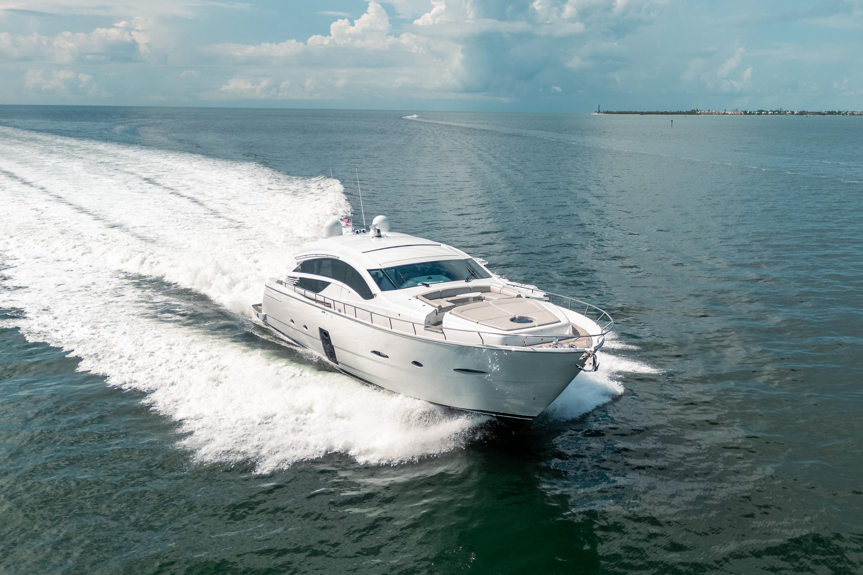 Luxury 2010 Pershing 80 yacht cruising on open water.