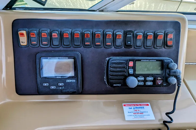  Yacht Photos Pics Control panel of 2004 Carver 360 Mariner with depth gauge and radio equipment.
