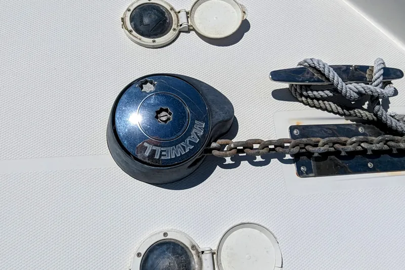  Yacht Photos Pics Anchor windlass and cleat on 2004 Carver 360 Mariner boat deck.