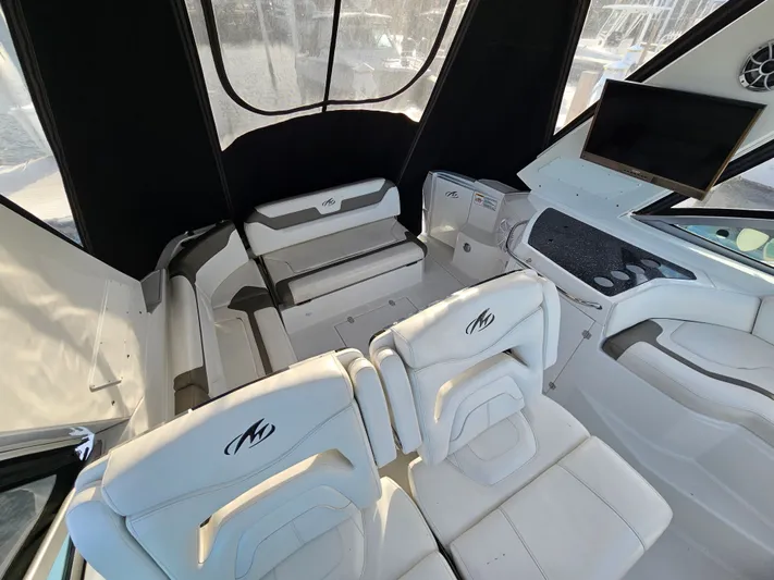 Second Half Yacht Photos Pics Interior of a 2016 Monterey 355 Sport Yacht with white seating and modern design.
