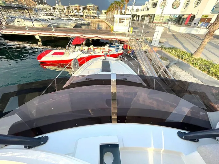 Rialtin Yacht Photos Pics Beneteau Monte Carlo 52 yacht docked at marina, view from deck, 2022 model.