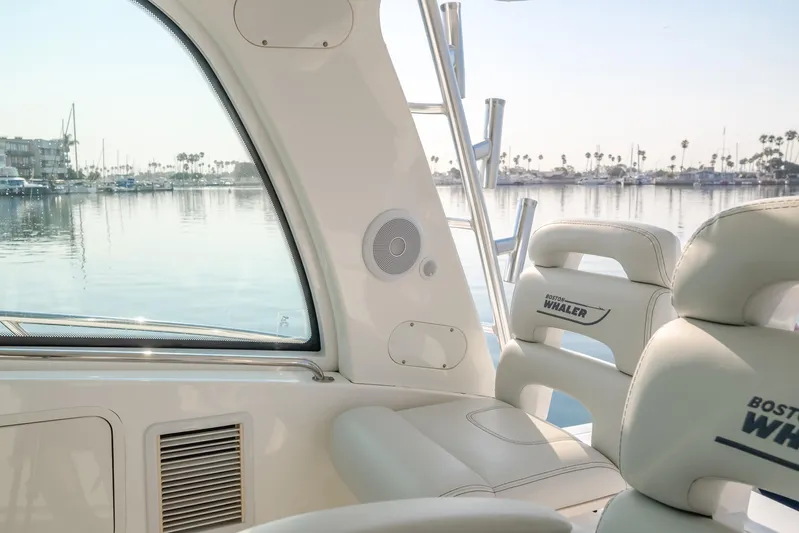 Giddy Up Yacht Photos Pics 2009 Boston Whaler 345 Conquest interior with marina view.