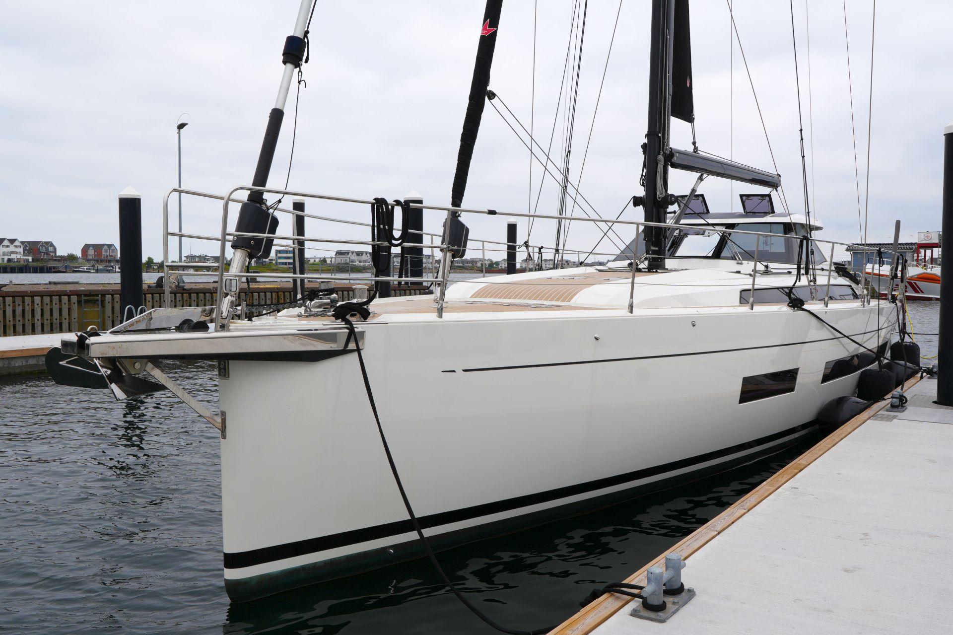 2023 Amel 60 sailboat docked in harbor.