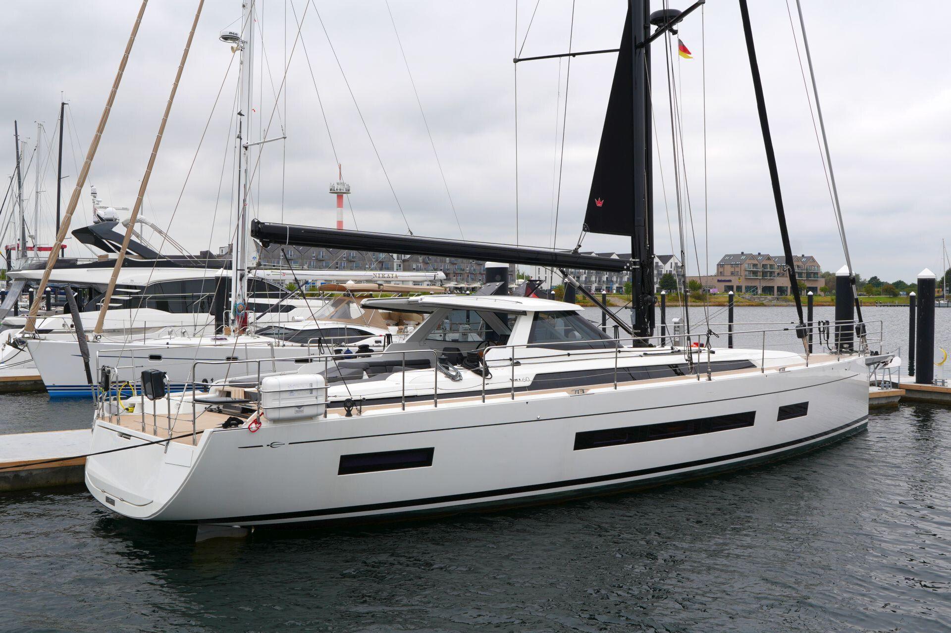 Amel 60 sailboat 2023 docked in harbor.