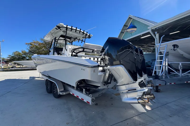  Yacht Photos Pics 2023 Fountain 34 Tournament Edition boat with dual Mercury engines on a trailer.