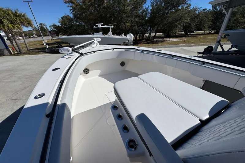  Yacht Photos Pics 2023 Fountain 34 Tournament Edition boat with spacious seating and sleek design.