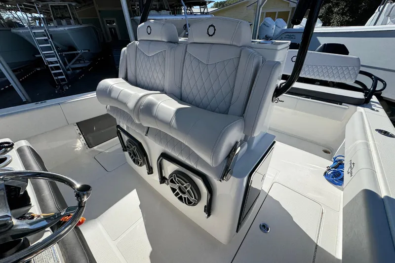  Yacht Photos Pics 2023 Fountain 34 Tournament Edition boat interior with luxury seating and modern design.