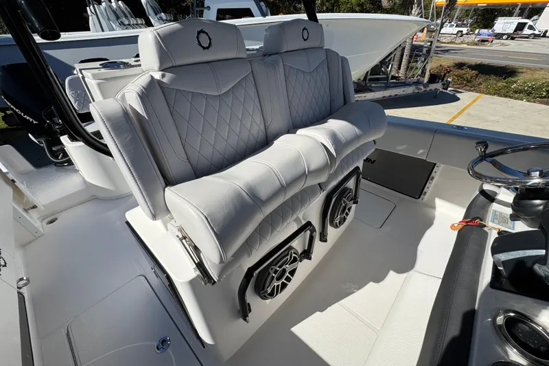  Yacht Photos Pics 2023 Fountain 34 Tournament Edition boat with luxurious seating and modern dashboard.