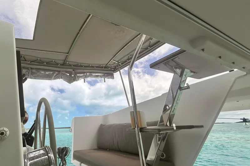 Sabai Sabai Yacht Photos Pics 2018 Fountaine Pajot Lucia 40 yacht interior with ocean view and seating area.