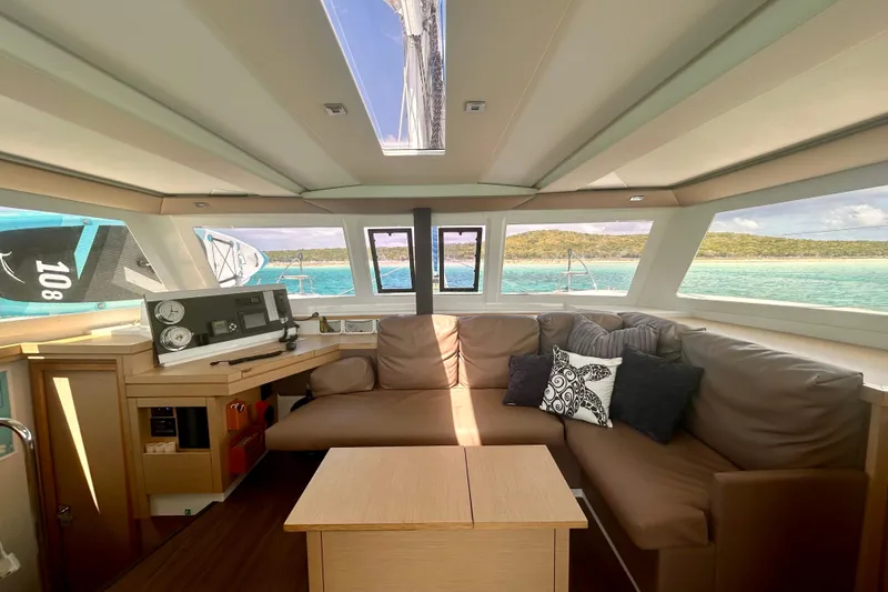 Sabai Sabai Yacht Photos Pics Luxurious interior of 2018 Fountaine Pajot Lucia 40 catamaran with scenic ocean view.