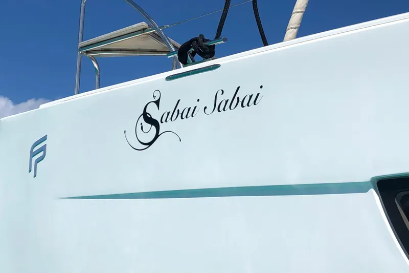 Sabai Sabai Yacht Photos Pics Fountaine Pajot Lucia 40 catamaran, 2018 model, with "Sabai Sabai" name on the side.