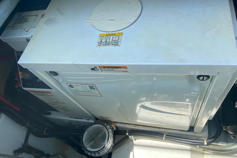 Sabai Sabai Yacht Photos Pics Engine compartment of 2018 Fountaine Pajot Lucia 40 catamaran, featuring Onan generator.