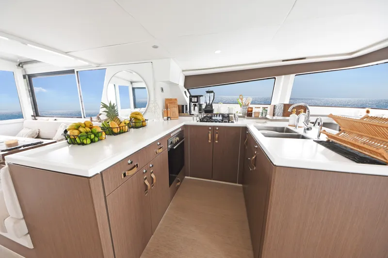 Crystal Dreams Yacht Photos Pics Luxurious kitchen interior on 2022 Bali 5.4 yacht with ocean view.