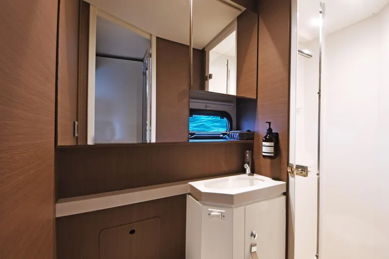 Crystal Dreams Yacht Photos Pics Modern bathroom interior in 2022 Bali 5.4 yacht, featuring sleek design and ocean view.
