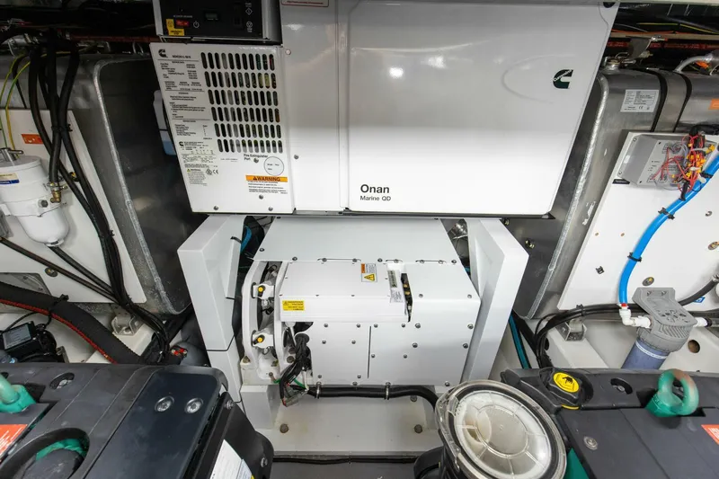 Pass-n-bye Yacht Photos Pics Engine room of 2023 Prestige 460 Flybridge with Onan marine generator.