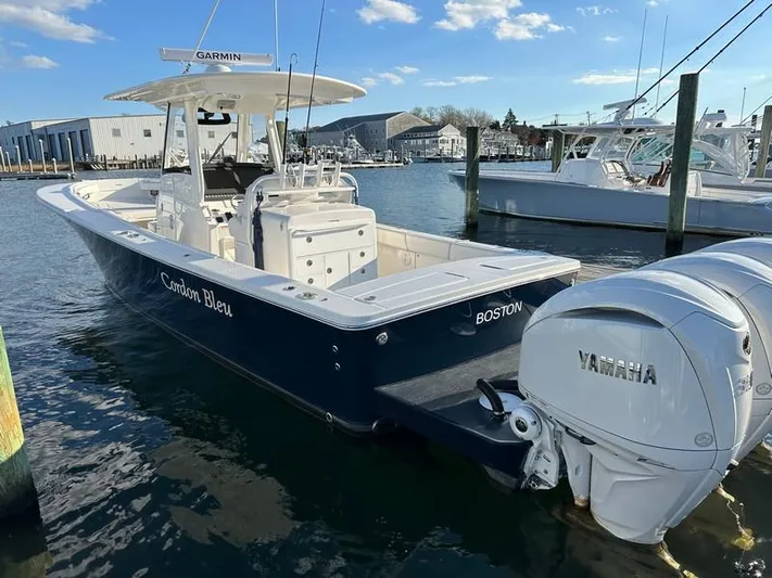 Cordon Bleu Yacht Photos Pics 2023 Regulator 34 boat docked, featuring Yamaha engines and Garmin equipment.