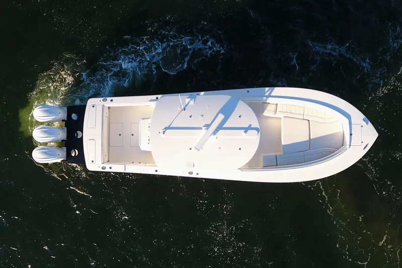 Cordon Bleu Yacht Photos Pics Aerial view of 2023 Regulator 34 boat cruising on water.