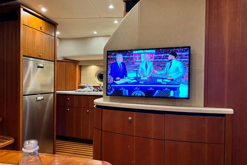 My Lucky Penny Yacht Photos Pics Interior of 2006 Tiara Yachts 4300 Sovran with TV and modern kitchen amenities.