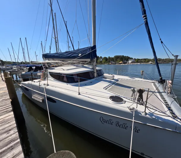 Quelle Belle Vie Yacht Photos Pics 2008 Fountaine Pajot Mahe 36 catamaran docked at a marina.