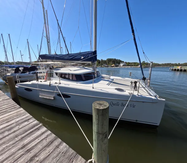 Quelle Belle Vie Yacht Photos Pics 2008 Fountaine Pajot Mahe 36 catamaran docked at a marina on a sunny day.