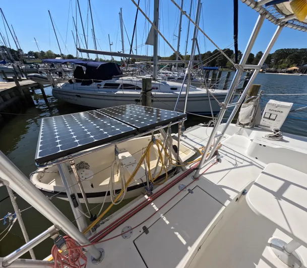 Quelle Belle Vie Yacht Photos Pics 2008 Fountaine Pajot Mahe 36 catamaran with solar panels docked at marina.