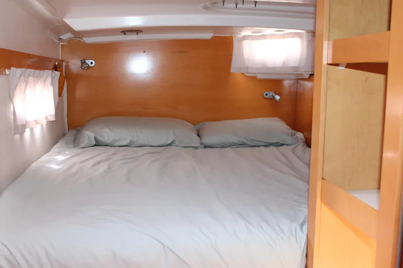 Quelle Belle Vie Yacht Photos Pics Cozy cabin interior of 2008 Fountaine Pajot Mahe 36 catamaran with double bed.