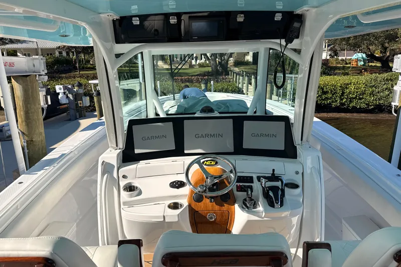  Yacht Photos Pics Cockpit of 2022 HCB 42 Lujo boat with Garmin navigation displays.