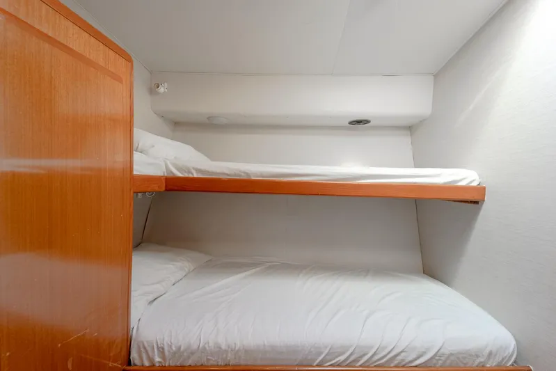 Tam Tam Yacht Photos Pics Bunk beds in 1997 Viking 58 Convertible yacht cabin.