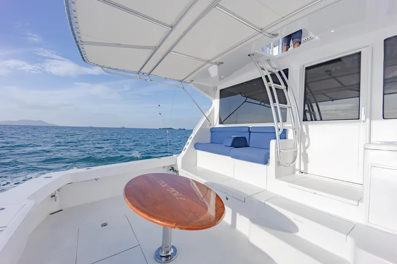 Tam Tam Yacht Photos Pics 1997 Viking 58 Convertible yacht with spacious deck and ocean view.