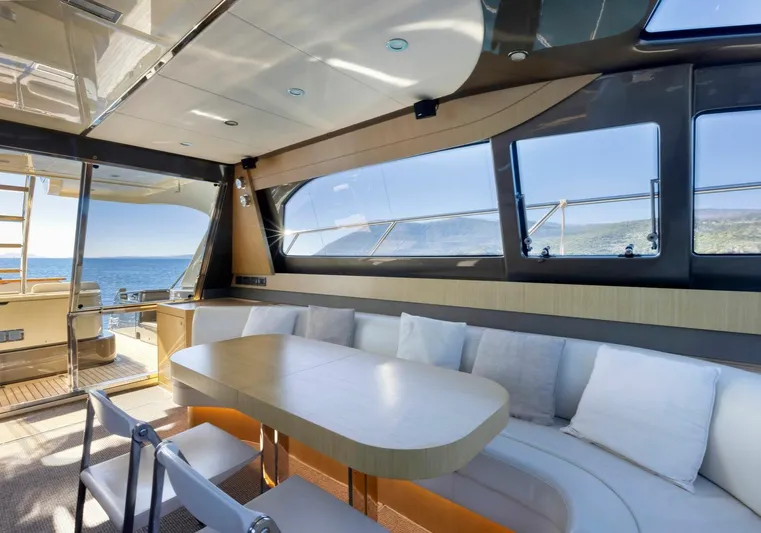  Yacht Photos Pics Luxurious 2009 Riva Sportriva yacht interior with elegant seating and ocean view.