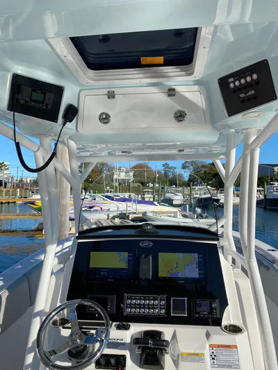  Yacht Photos Pics 2020 Sea Fox 288 Commander boat dashboard with navigation screens and controls.
