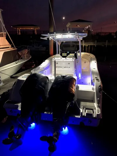 Yacht Photos Pics 2020 Sea Fox 288 Commander boat with illuminated blue underwater lights at night.
