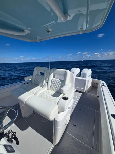  Yacht Photos Pics 2019 Intrepid 327 boat on open sea.