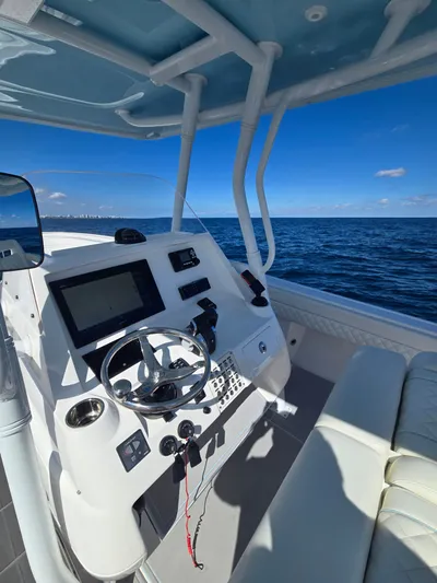  Yacht Photos Pics Intrepid 327 boat helm with ocean view, 2019 model.