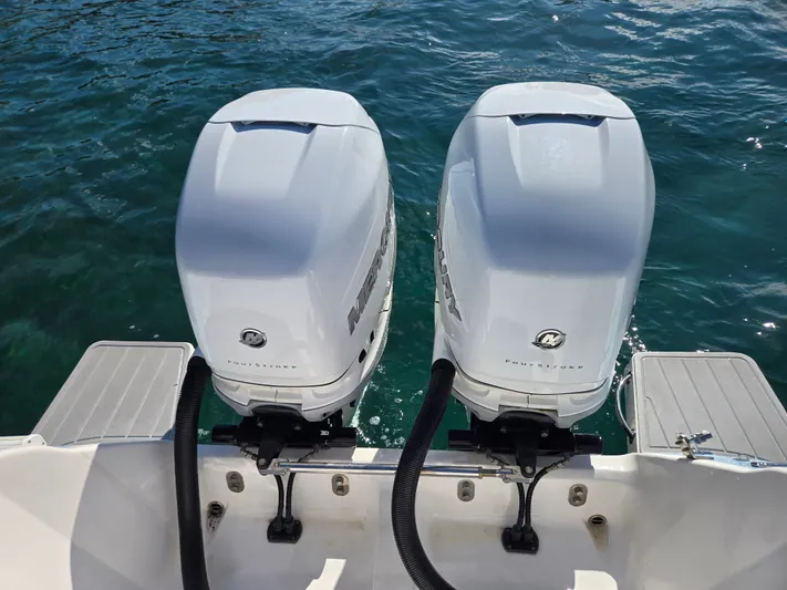  Yacht Photos Pics Two Mercury outboard engines on an Intrepid 327 boat, 2019 model.