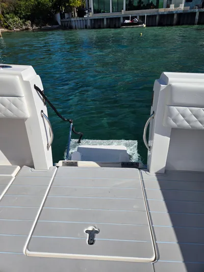  Yacht Photos Pics Intrepid 327 boat deck overlooking water, 2019 model.