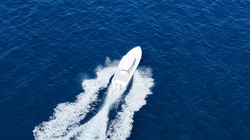  Yacht Photos Pics 2019 Intrepid 327 boat cruising on open sea.
