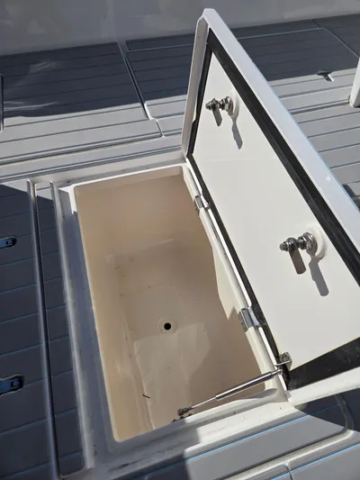  Yacht Photos Pics Open storage compartment on a 2019 Intrepid 327 boat.