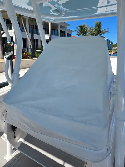  Yacht Photos Pics Covered helm station of a 2019 Intrepid 327 boat.